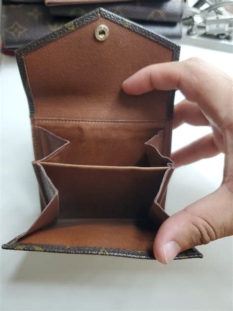 jag vs louis vuitton wallet|is louis vuitton wallet genuine.